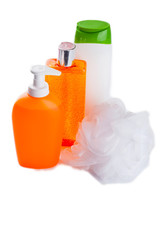 isolated  shampoo, shower gel, loofah on a white background