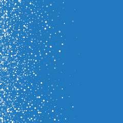 Random falling white dots. Scatter left gradient with random falling white dots on blue background. Vector illustration.