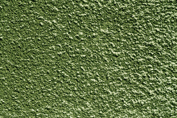 Green color plaster wall pattern.