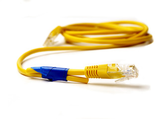 broken network cable connected anyhow with insulating tape on white background,