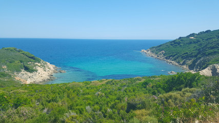 Fototapeta na wymiar Beautiful beach on Skiathos island in Greece, windy summer day in June