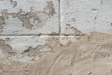 grey texture, old chipped plaster on the concrete wall, background