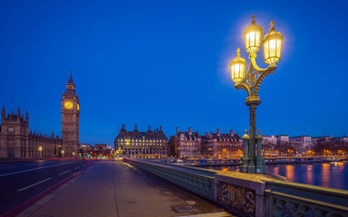 Fototapeta na wymiar London, England - The Big Ben and the Houses of Parliament with street lamp taken from westminster bridge at dusk