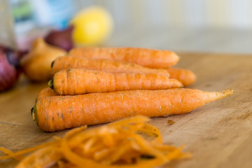 Close up of fresh, mature carrots. Rich in vitamins and minerals. Shallow depth of focus.