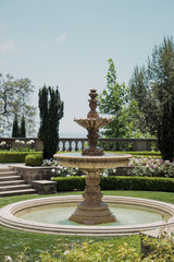 Flowerbeds and fountain in one of the park