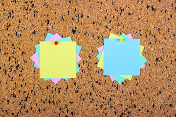 colorful sticky notes on cork bulletin board