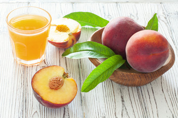 Ripe peaches and peach juice