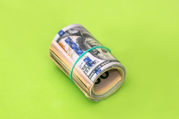 100 dollar isolated on green background