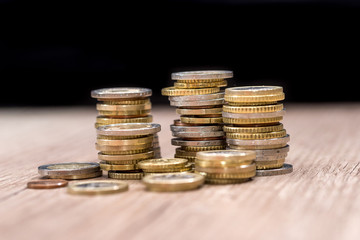 euro coins in a pile at table. close up