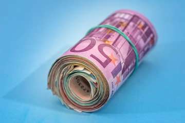 500 euro banknote isolated on blue background