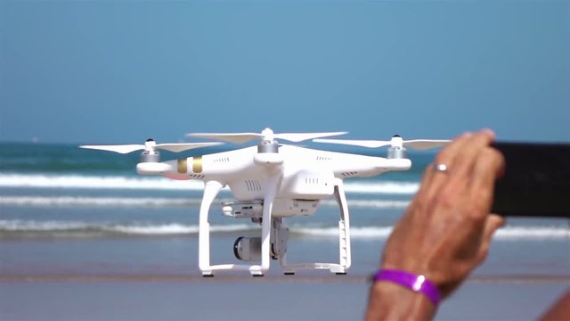 High quality video of taking pictures of a drone in real 1080p slow motion 250fps