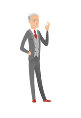 Senior caucasian businessman showing ok sign