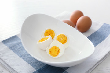 Tasty hard boiled eggs on plate. Nutrition concept