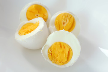 Tasty hard boiled egg, closeup. Nutrition concept