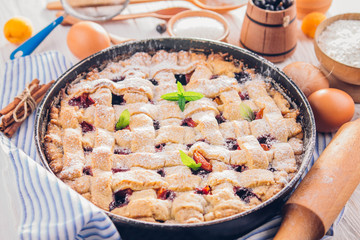 Black currant and apricot pie with ingredients