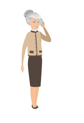 Caucasian business woman talking on a mobile phone
