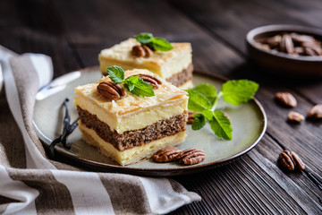 Delicious cremeschnitte with vanilla custard cream and pecan nut dough