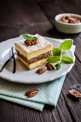Delicious cremeschnitte with vanilla custard cream and pecan nut dough