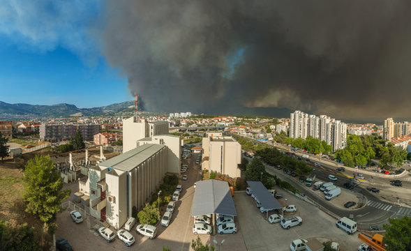 17-July-2017 Huge wildfire over Dalmatia region and in suburb of second largest town Split in Croatia. Panoramic aerial view from eastern entrance in city. 