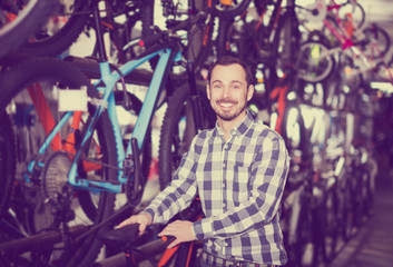 Obraz na płótnie Canvas Male customer in bike shop