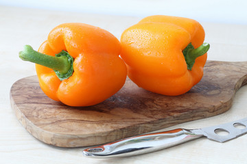 Tomatoes, knife on the board 