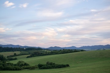 Fototapeta na wymiar Colorful sunset on meadow. Slovakia