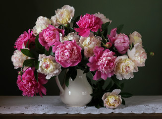 Bouquet of pink and white peonies. Flowers in a vase.