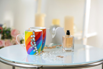 Rings and accessories for lesbian wedding on table