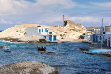 Small and quiet seaside settlement of Agios Konstantinos on island of Milos. Cyclades, Greece. © vivoo