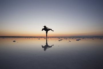 Sunset salt lake silhouette high kick