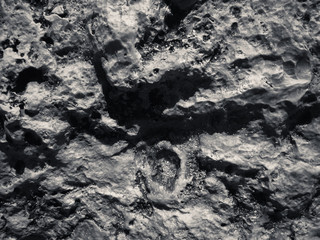 Naklejka premium Macro closeup on surface of the rock stone dark background