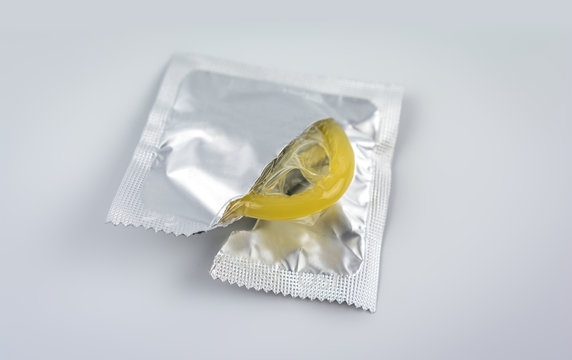 Condom close-up. Contraceptive protection from pregnancy, AIDS.