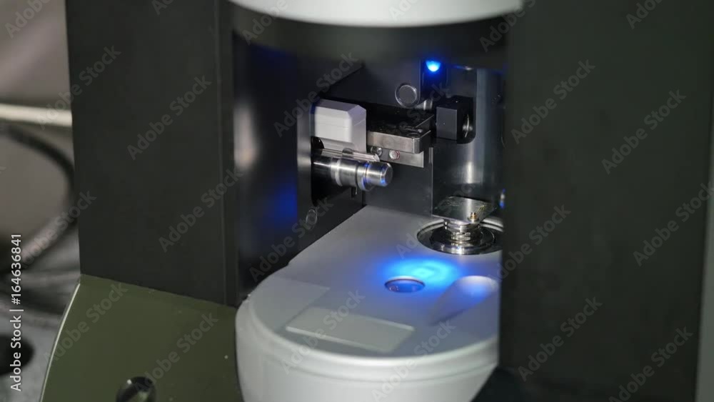 Poster close up of 3d printer operating in design studio. electronic three dimensional plastic printer duri