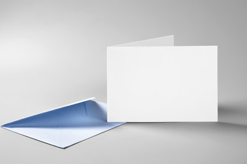 Blank folded standing card and envelope 