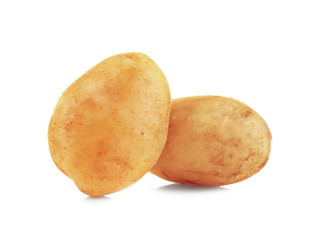 Raw unpeeled potatoes on white background