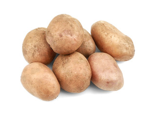 Raw unpeeled potatoes on white background