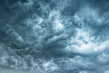 texture with dramatic grey storm clouds on background