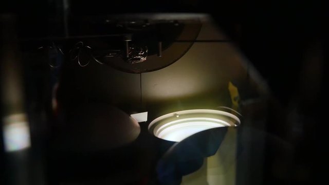 Old slide projector light path. Unit the light inside close up