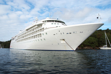 Fototapeta na wymiar Large luxury white cruise ship liner at Fowey
