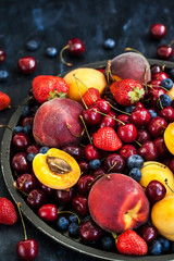 Fresh ripe summer berries and fruits