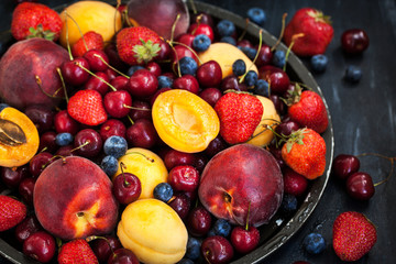 Fresh ripe summer berries and fruits