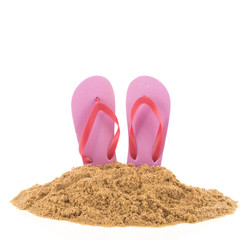 Pink flip flops at the beach