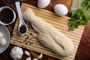 Chinese vermicelli with additional ingredients for cooking