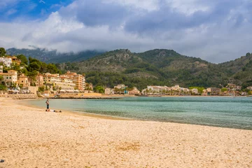 Foto op Canvas Puerto de Soller, Port of Mallorca island in balearic islands, Spain. Beautiful  beach and bay with boats in clear blue water of summer day. © Simon Dannhauer