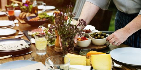 Woman Preparing Table Dinner Concept