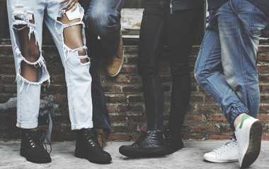 Women Legs Stand Against Wall