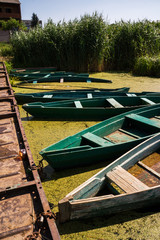The sunken boats near the pier