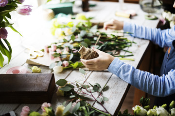 Florist Making Fresh Flowers Bouquet Arrangement