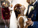 Newlywed African Descent Couple Dancing Wedding Celebration