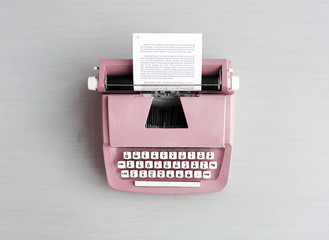 Retro Typewriter Machine on Gray Table